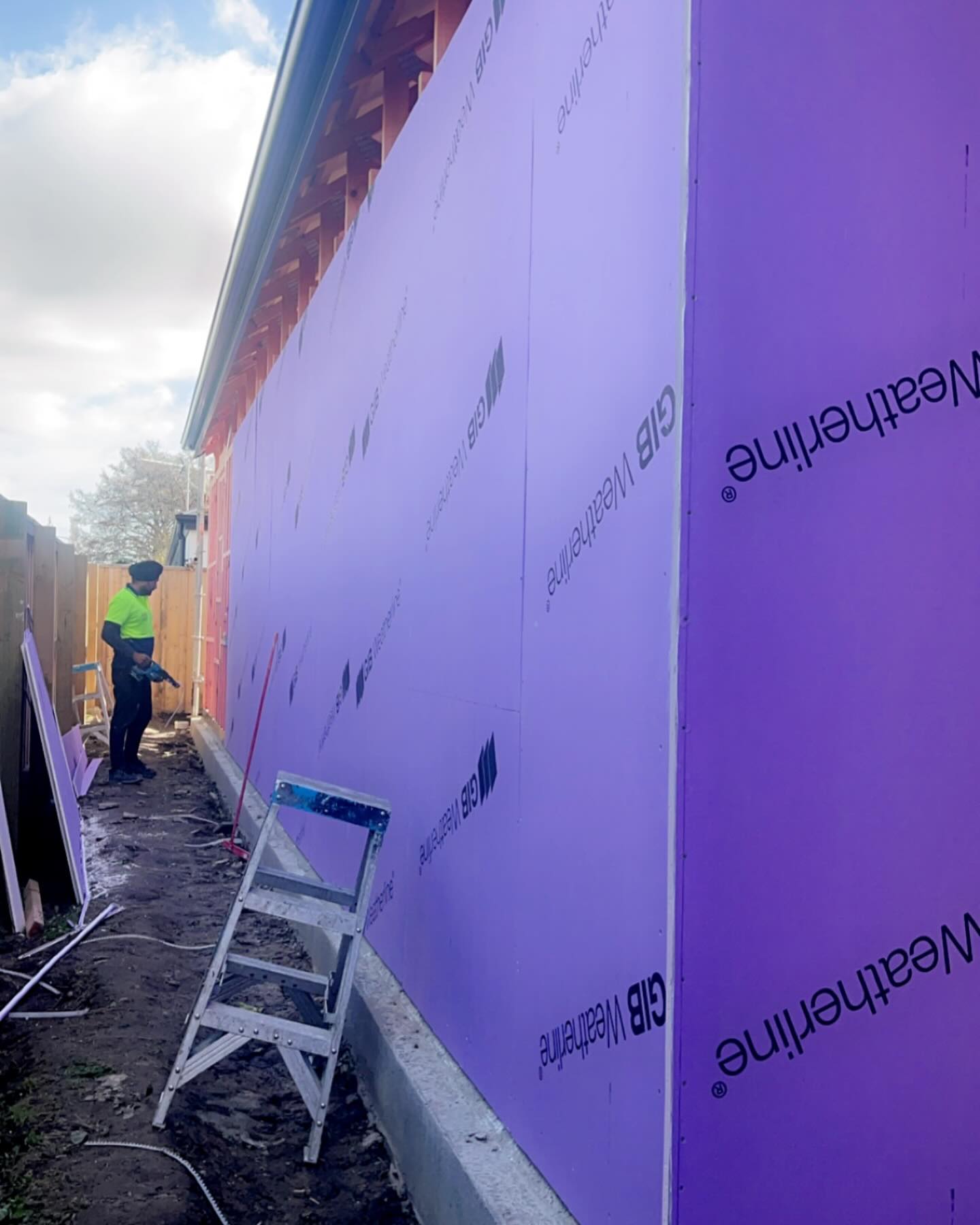 Crew installing GIB Weatherline exterior bracing board